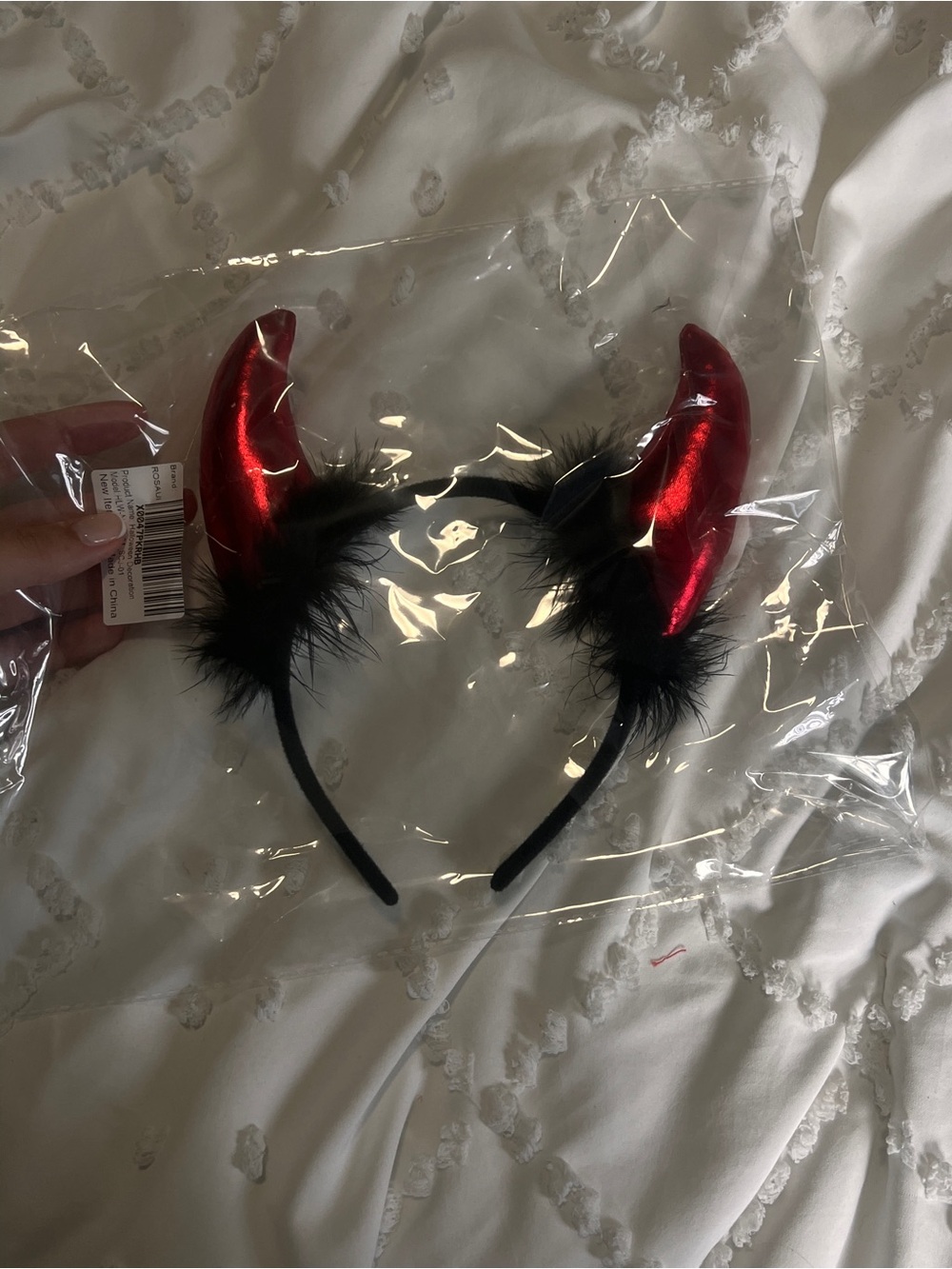 Shiny Red Devil Horn Headband with Black Feather Trim